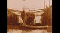Pond5 1900s: sailors march. ship comes out of dry dock. men on ship. bridge.