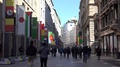 4k Pedestrian People Walk Commercial Road In Milan Old Town Expo Flag Wave Day