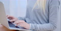 Blurred Woman Using Her Laptop Computer