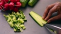 Closeup Of Person Hands Chopping Cucumber For Vegan Dish - 15 Se