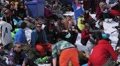 Crowd Of People Relax In Encamp. Ski Resort. Snowboarders And Skiers. Sunny Day