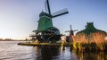 General View Of Traditional Dutch Windmills. 4 In 1 - 4k Time Lapse Footages.