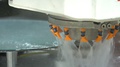 Macro Of Cnc Machine. Closeup Of Water Cooled Cnc Machine Milling Edges Of
