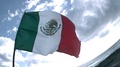 Mexican Flag Waving On Beach In Slow Motion
