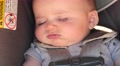 Newborn Baby Sleeping In His Carseat