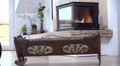 Pond5 Slow motion: fireplace burning with baby crib in front