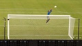 Soccer Goalkeeper Catches The Ball During Training.
