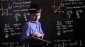 Pond5 Student boy teenager running on the tablet science formula math problem math