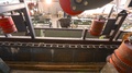 Wooden Beam On Conveyor, Wood Processing At A Woodworking Factory, Industrial